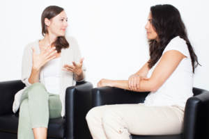A same-sex couple participating in marriage counseling