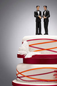 Non-religious wedding venues might have two male cake toppers. 