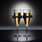 Champagne glasses with bowtie decoration