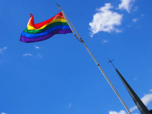 Rainbow LGBTQ flag outside a Mormons church