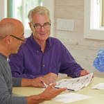 older gay couple sitting at table