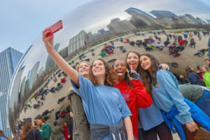 a destination bachelorette party taking a selfie in Chicago