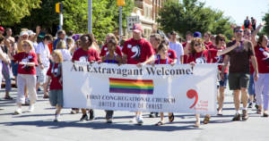 People of faith marching at a Pride parade