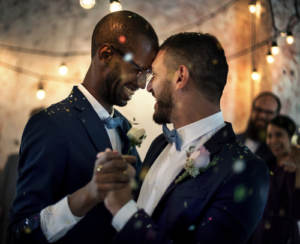 A newlywed couple sharing their first dance