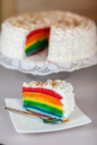 A hidden rainbow wedding cake is one of many great simple wedding ideas