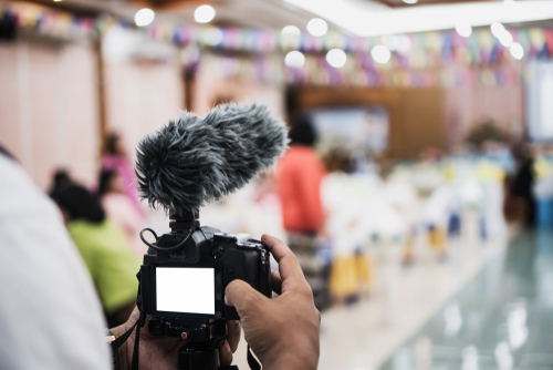 Photographer livestreaming a wedding.