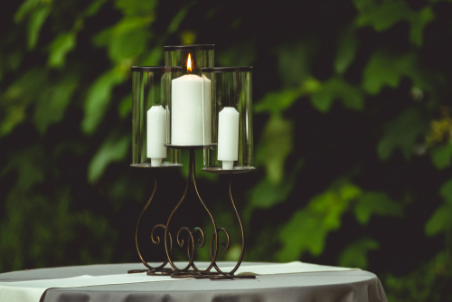 candles used for unity rituals displayed on a table