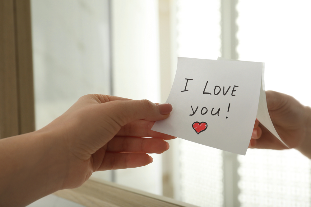 I love you written on a note is one of many simple ways to show your love for your partner.