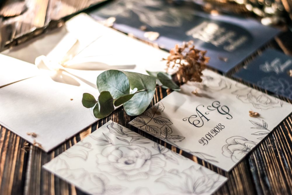 Wedding invites on a table being considered when not inviting non-affirming family.