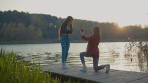 How should you share your engagement with disapproving family?